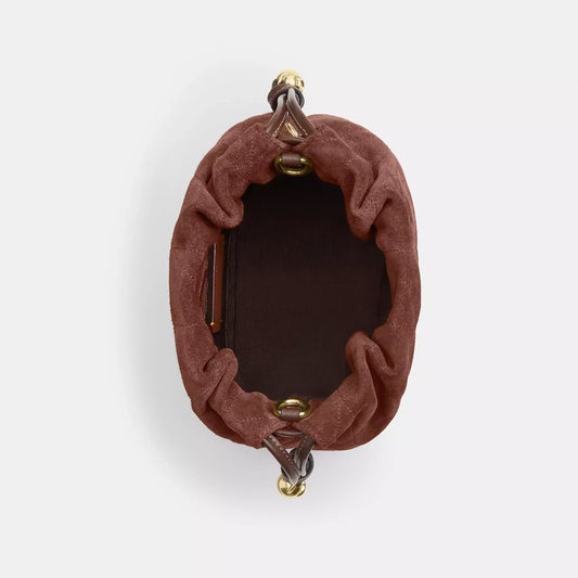 Faye mini drawstring bag with quilting / Coach