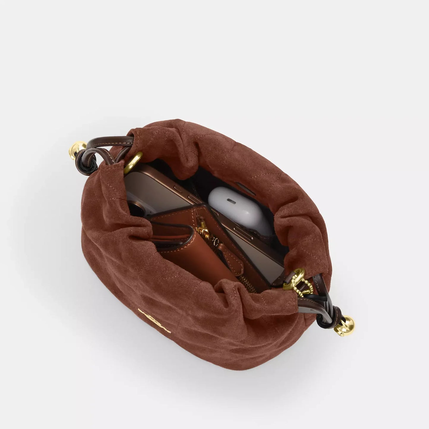 Faye mini drawstring bag with quilting / Coach