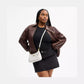 Teri Shoulder Bag In Signature Canvas (Blanco) / Coach